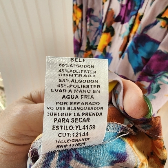 Ya sleeveless yellow top with bold multi colored bottom in a floral pattern. - Picture 9 of 9